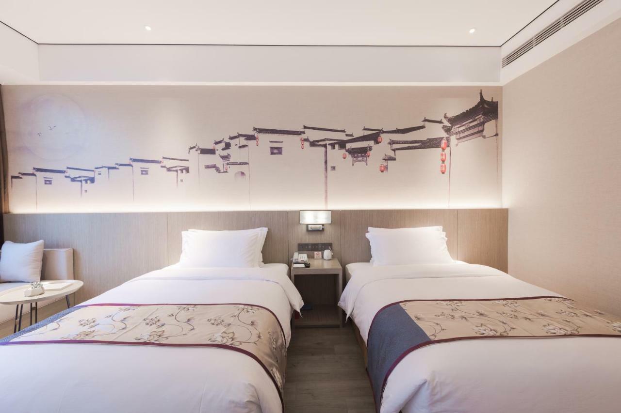 Grace Select Hotel Hszincsiao Kültér fotó