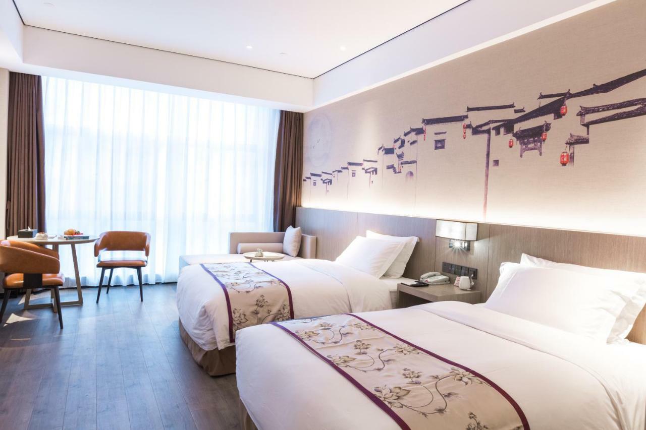 Grace Select Hotel Hszincsiao Kültér fotó