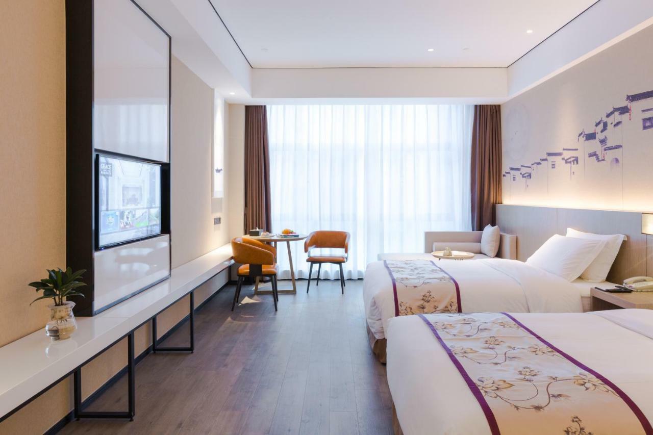 Grace Select Hotel Hszincsiao Kültér fotó